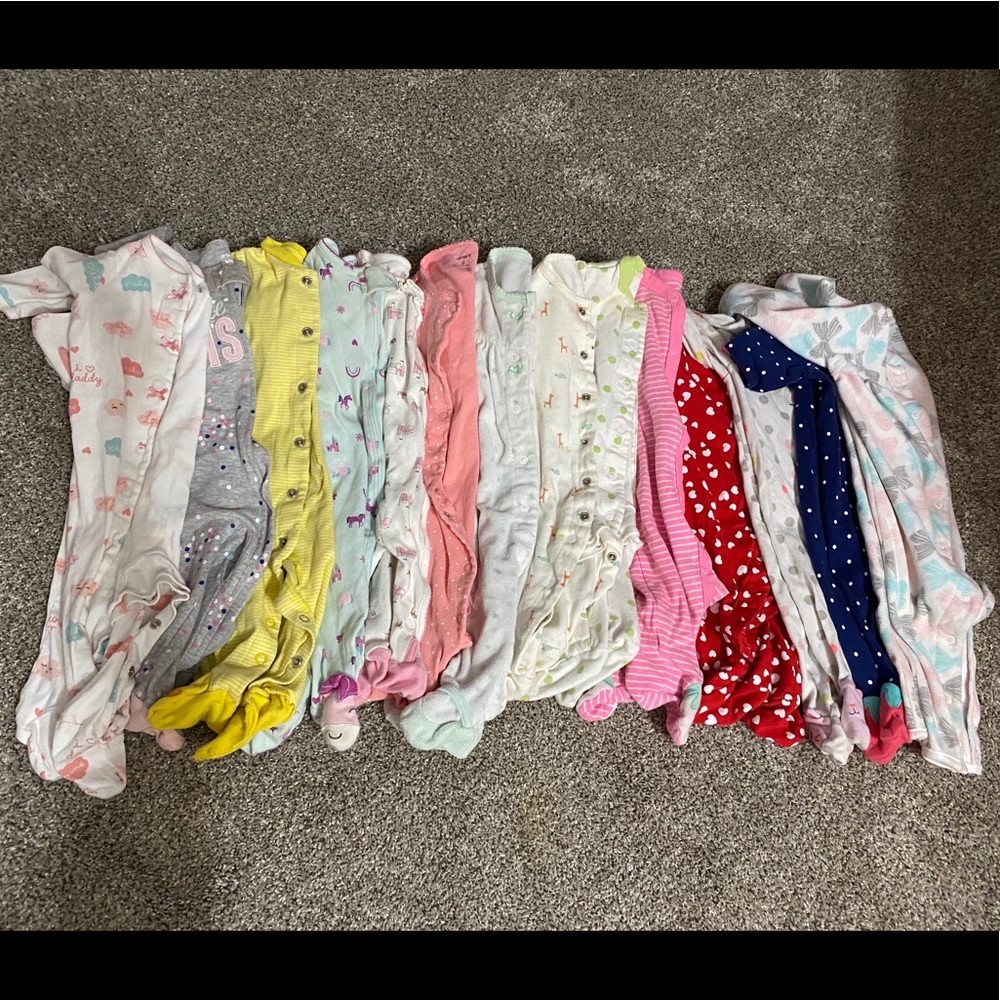 14 pairs of size 6 month pjs